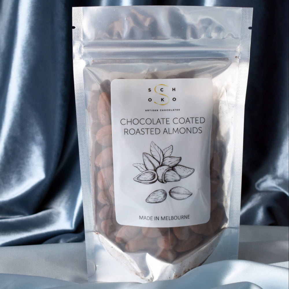 A bag of chocolate coated roasted almonds from Schoko Chocolates.